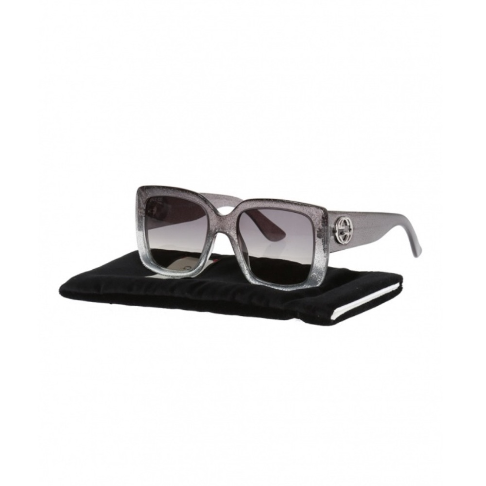 Authentic Gucci Sunglasses with glitter frame.